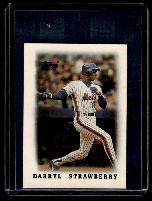 Baseball card of Darryl Strawberry in pinstriped uniform for Topps Major League collection