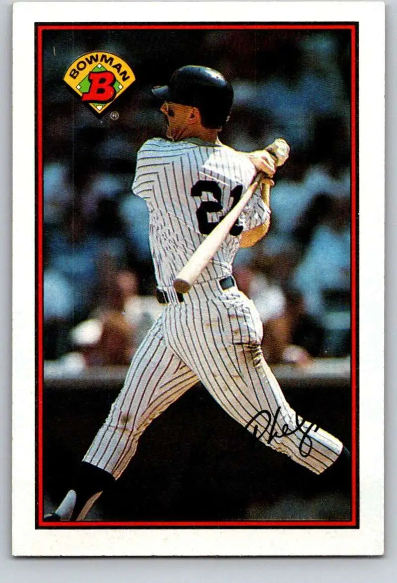 Ken Phelps swinging in New York Yankees pinstripe uniform on 1989 baseball card