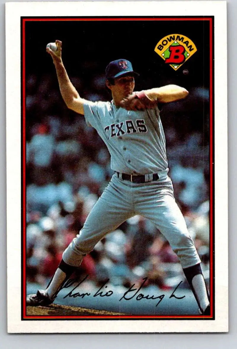 Baseball player Charlie Hough in Texas Rangers uniform mid-pitch on baseball card