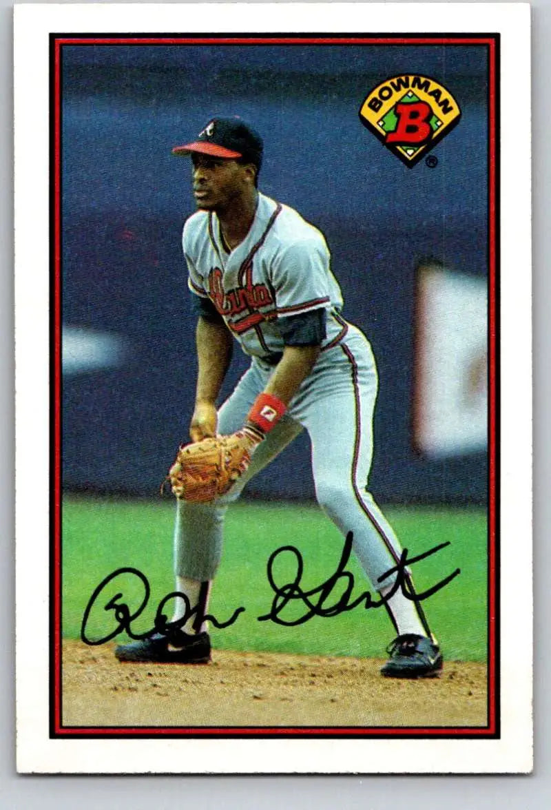 Baseball card of Ron Gant fielding for Atlanta Braves in white and orange uniform