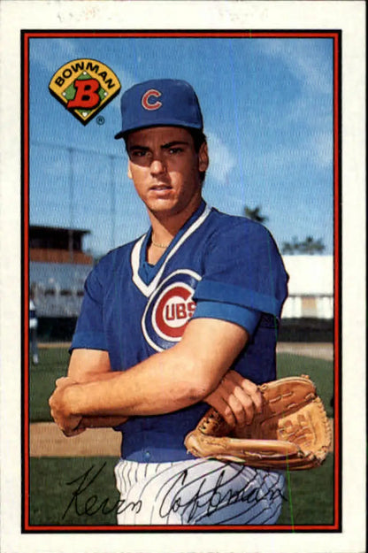 Baseball card of Kevin Coffman in blue uniform for Chicago Cubs holding a glove