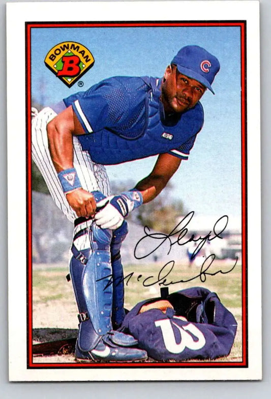 Lloyd McClendon in Chicago Cubs uniform next to equipment bag and baseball card