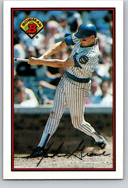 Baseball player in pinstriped Florida Marlins uniform swinging bat on Mark Grace baseball card