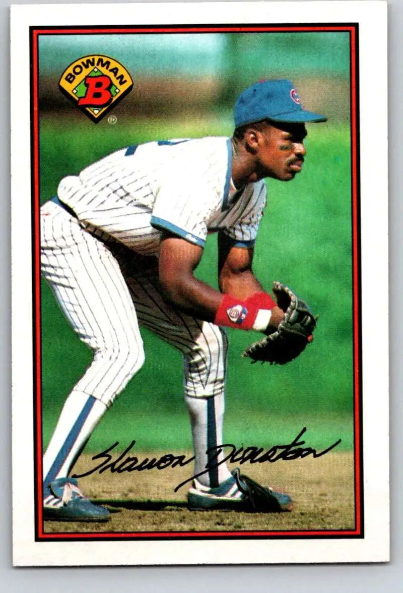 Baseball card of Shawon Dunston in pinstripe uniform for Chicago Cubs in fielding stance