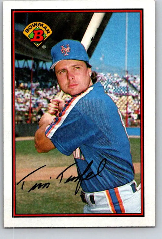 Baseball player in New York Mets uniform batting with 1989 Tim Teufel baseball card