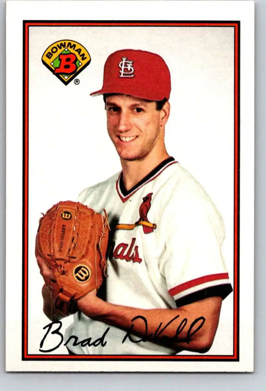 Baseball card of Brad DuVall, pitcher for the St. Louis Cardinals in a white uniform