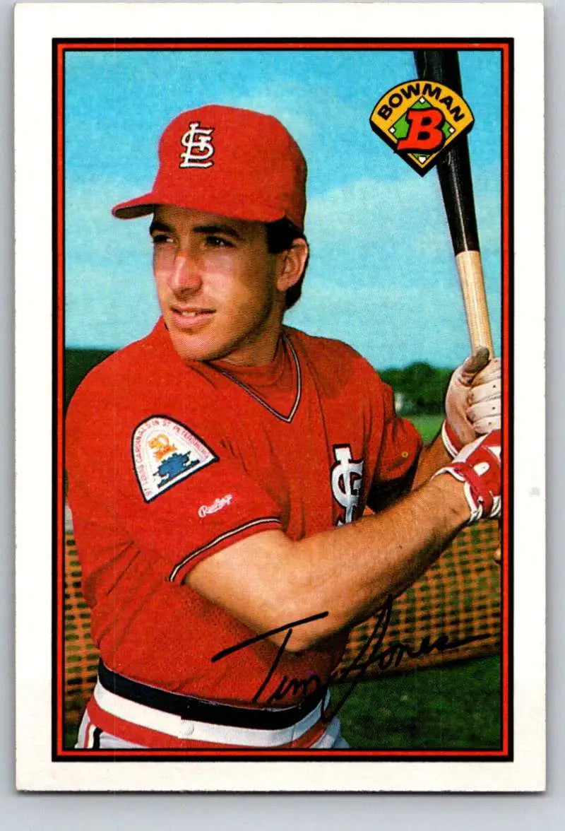 Tim Jones in red St. Louis Cardinals uniform holding bat for NM-MT card