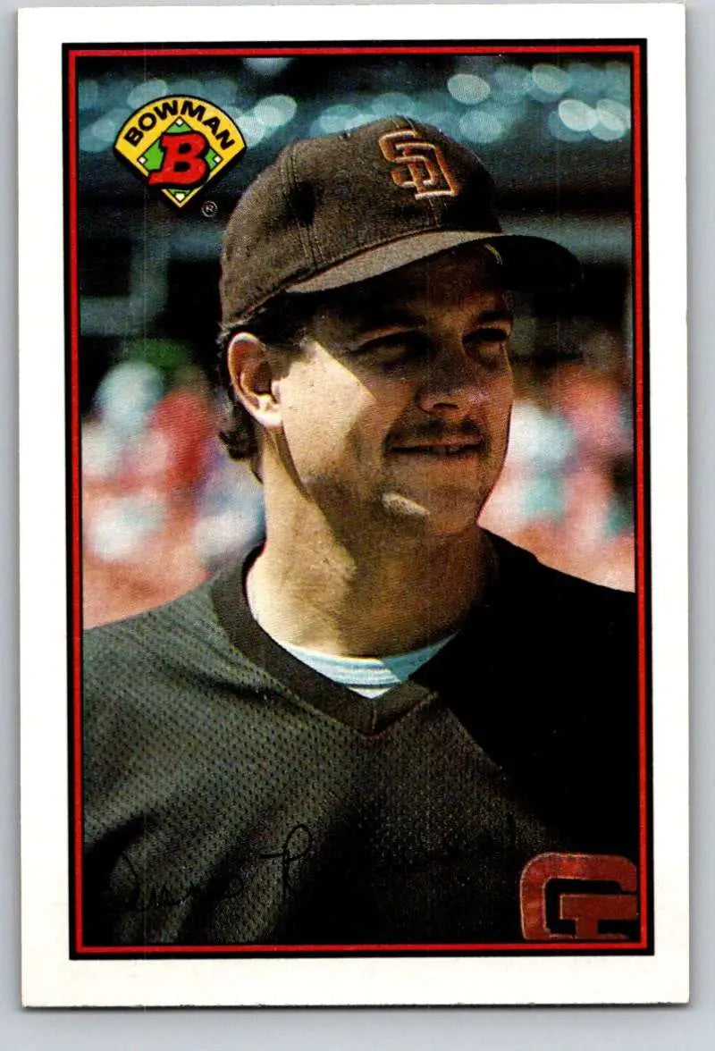 Baseball player in dark uniform and San Francisco Giants cap promoting Dennis Rasmussen card