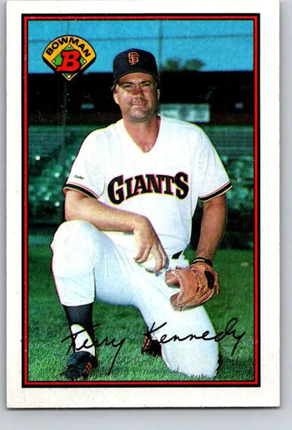 Baseball player Terry Kennedy in San Francisco Giants uniform kneeling on one knee