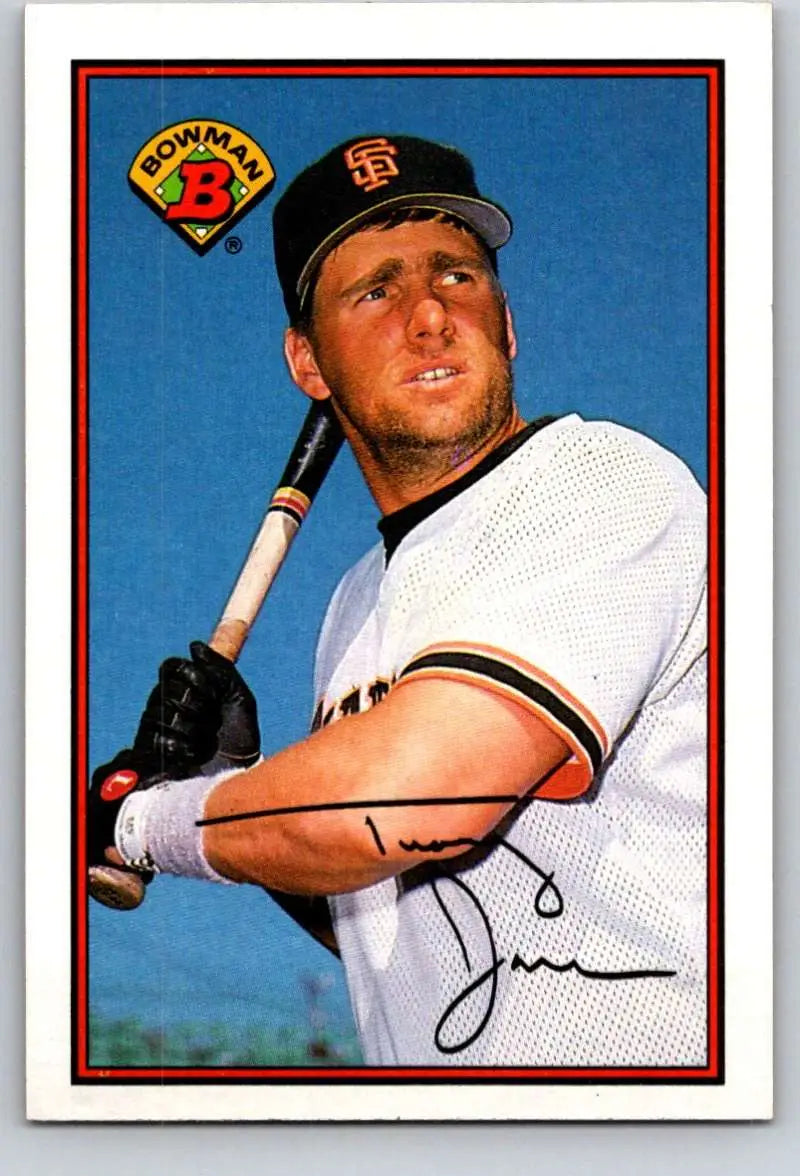 Baseball player in San Francisco Giants uniform ready to hit with bat