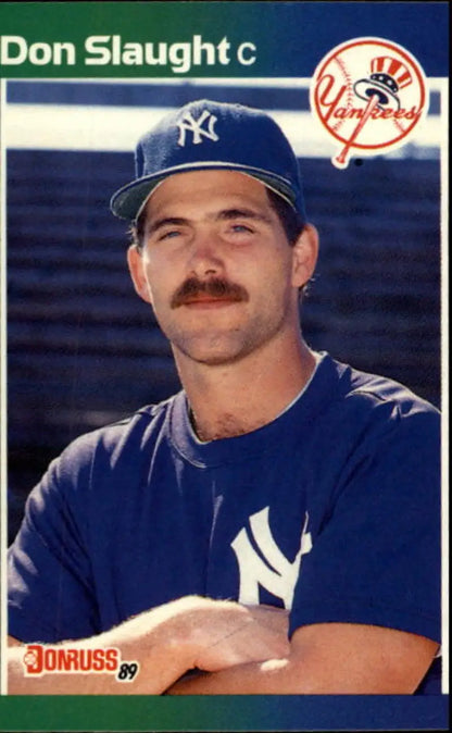 Don Slaught Yankees baseball card in navy uniform showcasing mustache and team cap