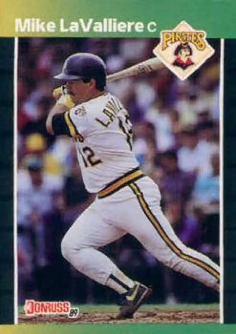 Baseball player in white Pittsburgh Pirates uniform swinging bat, Mike LaValliere card