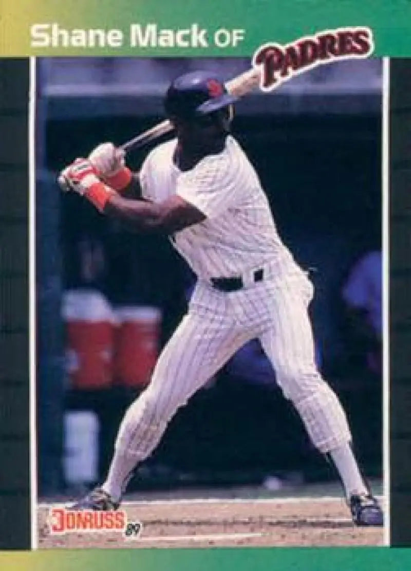 Shane Mack in a San Diego Padres pinstriped uniform at bat on baseball card