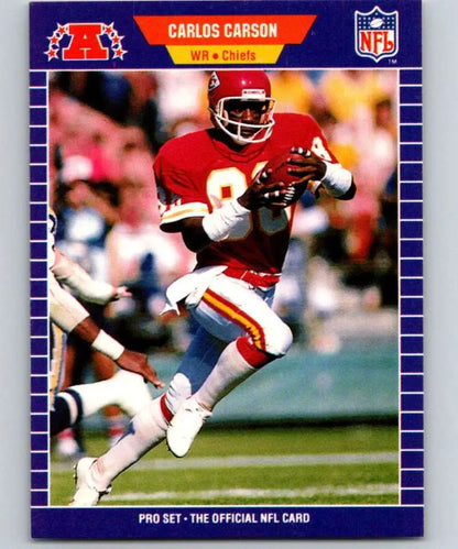 NFL trading card of Kansas City Chiefs player Carlos Carson in red jersey running with ball