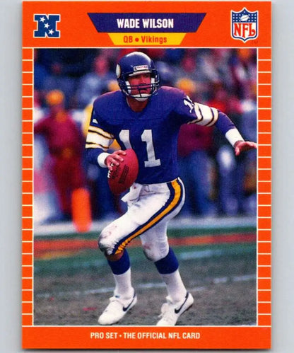 Minnesota Vikings Wade Wilson football card with orange border in action