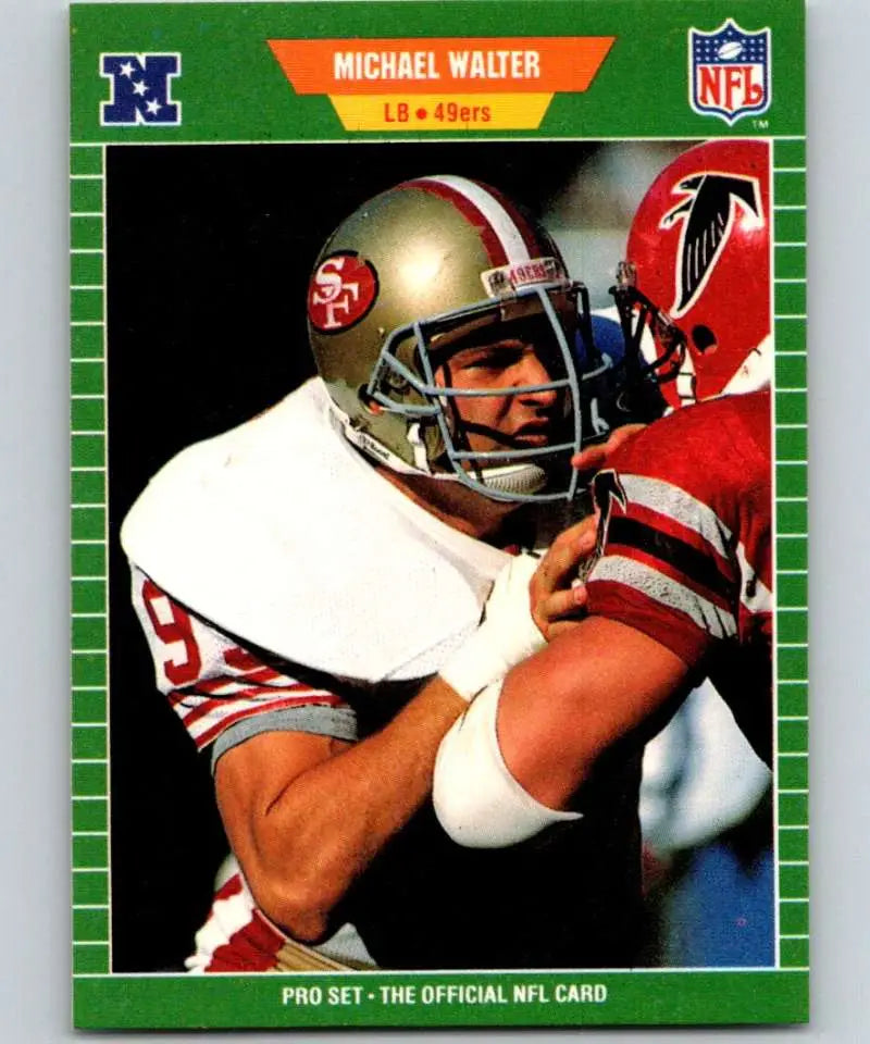 NFL trading card of Michael Walter tackling Atlanta Falcons in Pro Set series