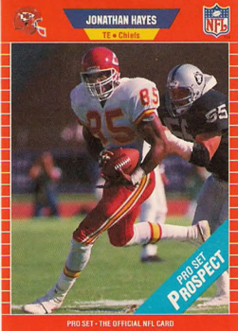 Vintage NFL trading card of Jonathan Hayes with Kansas City Chiefs against Raiders defender