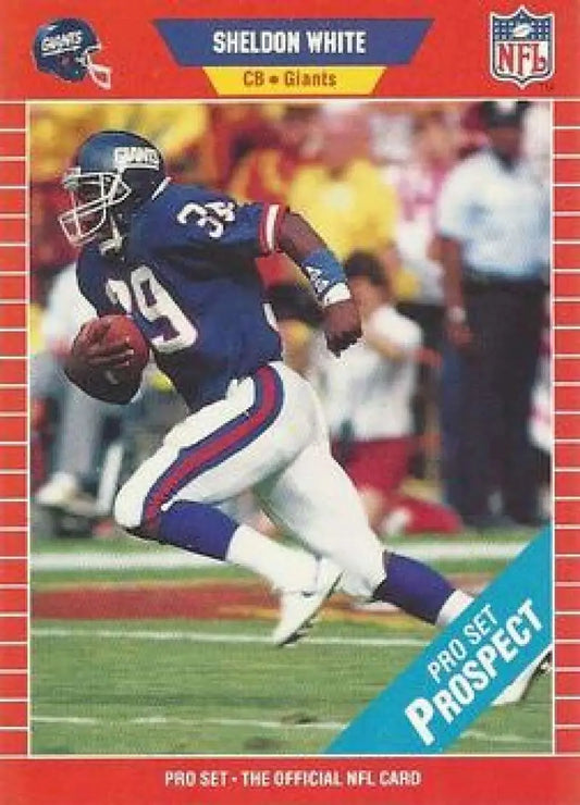 NFL trading card of Sheldon White, New York Giants player in blue jersey #39 running