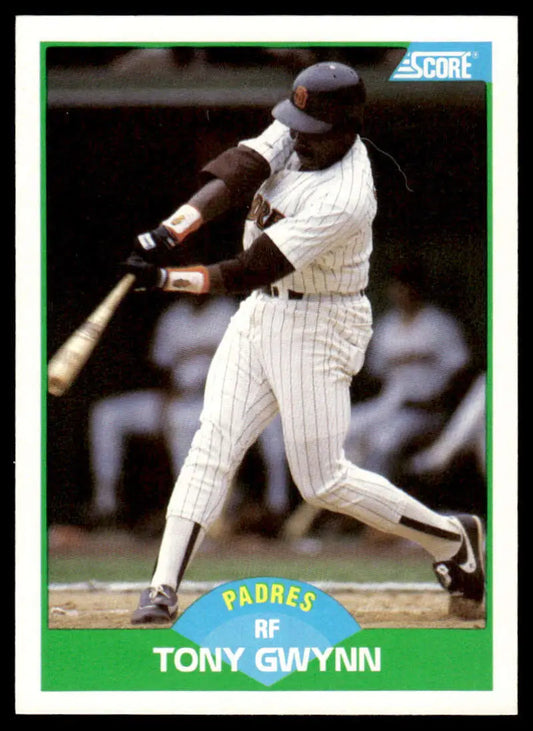 Baseball card of Tony Gwynn mid-swing in a white pinstriped San Diego Padres uniform