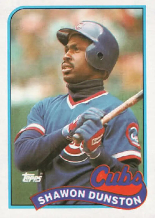 Shawon Dunston in a Chicago Cubs uniform with bat on 1989 Topps baseball card