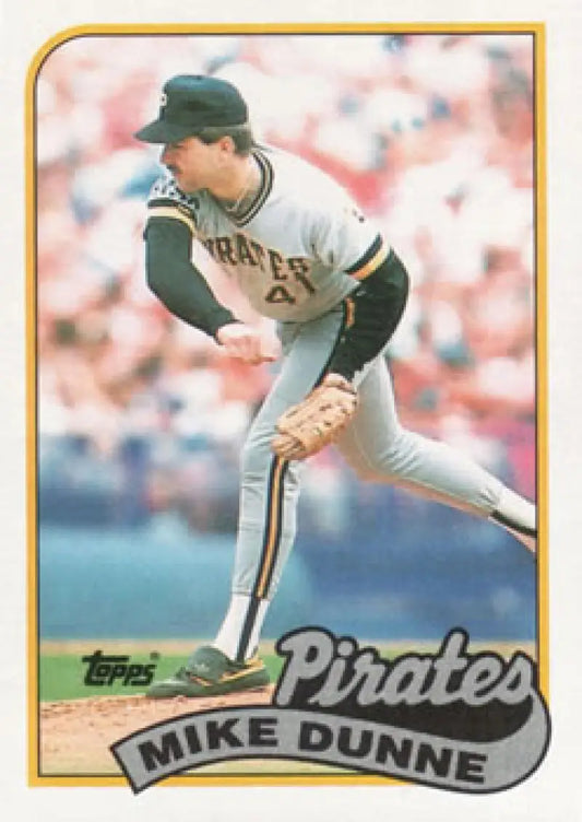 Baseball player Mike Dunne in Pittsburgh Pirates uniform mid-pitch delivery image