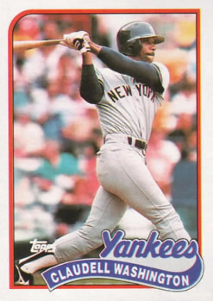 Claudell Washington New York Yankees baseball card mid-swing in white uniform