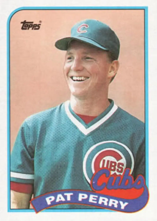 1989 Topps #186 Pat Perry baseball card of a smiling Chicago Cubs player in teal jersey