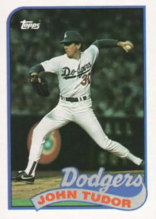 Baseball card of John Tudor mid-throw in white uniform, 1989 Topps #35 UER