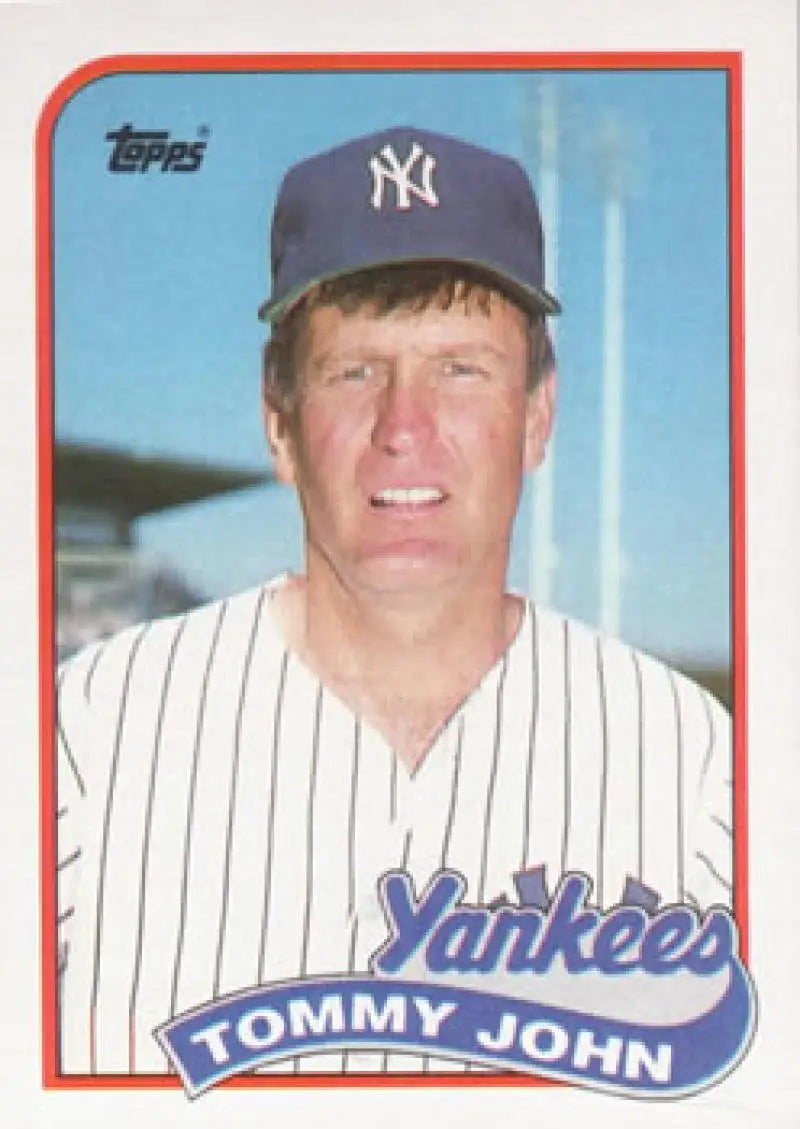 Baseball card of Tommy John in New York Yankees pinstripe uniform and navy cap