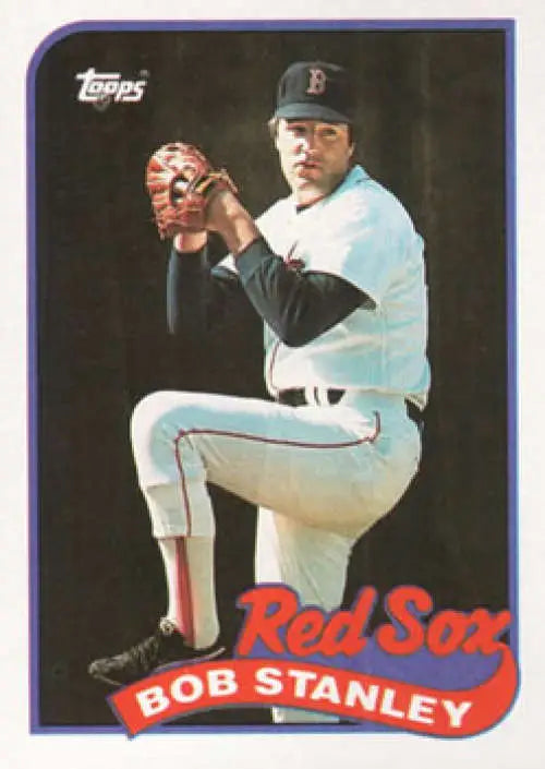 Baseball card of Bob Stanley in wind-up for Boston Red Sox wearing white uniform and cap