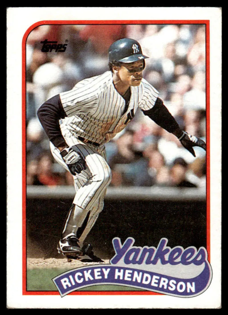 Rickey Henderson New York Yankees Baseball Card in Pinstriped Uniform at Bat