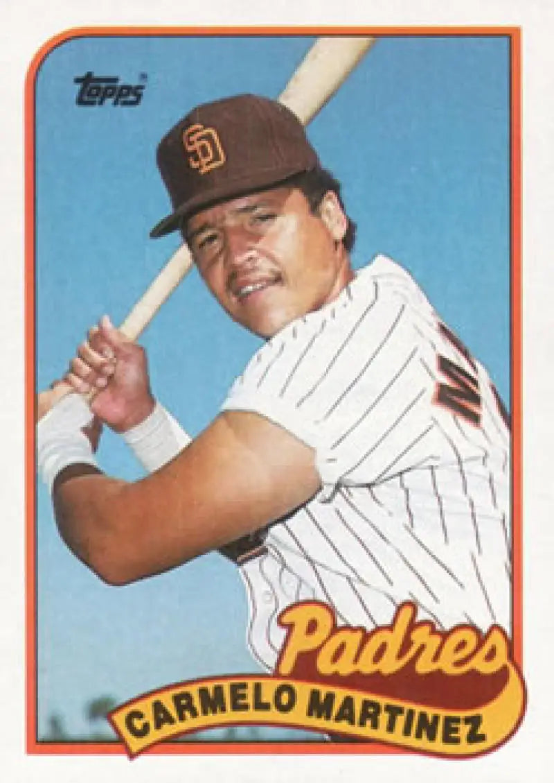 1989 Topps #449 Carmelo Martinez San Diego Padres baseball card in pinstripe uniform