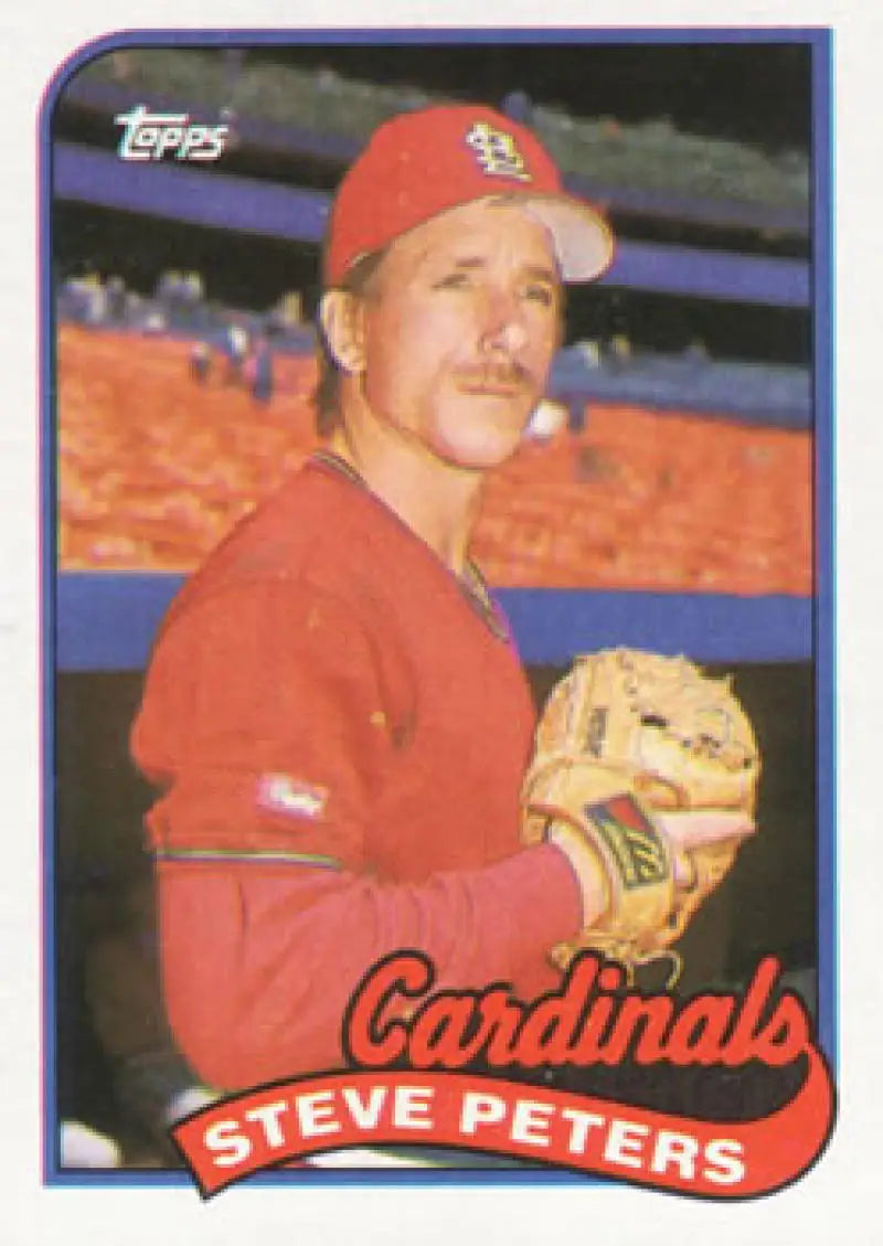 Baseball card of Steve Peters in St. Louis Cardinals red uniform and cap