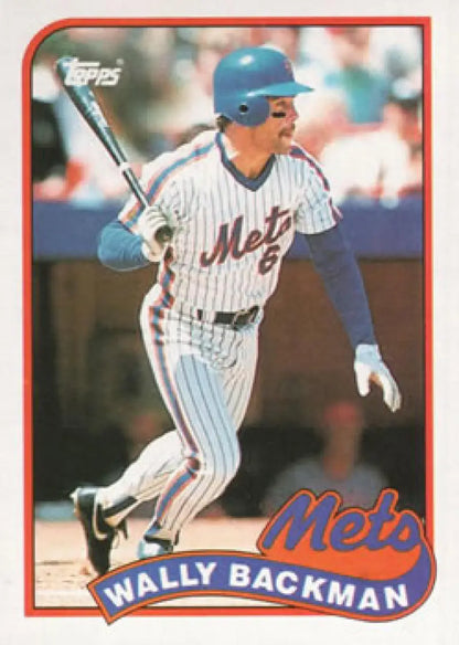 Wally Backman swinging bat in pinstriped uniform on New York Mets Baseball Card