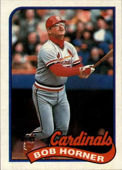 Baseball card of Bob Horner in batting stance for St. Louis Cardinals red uniform