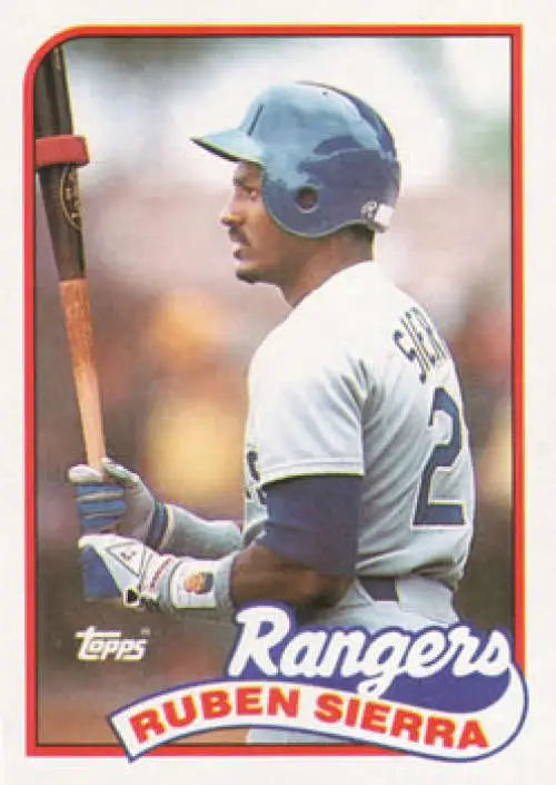 Ruben Sierra Texas Rangers baseball card in white uniform holding a bat