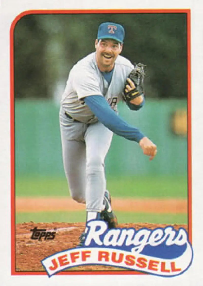 Baseball card of Jeff Russell pitching for Texas Rangers in gray road uniform