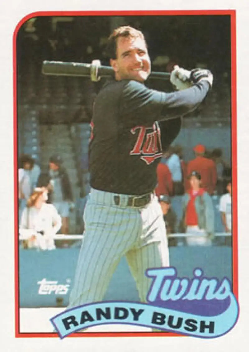 Baseball card of Randy Bush in Minnesota Twins uniform taking a practice swing