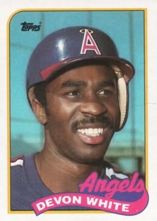 Baseball card of Devon White in navy California Angels uniform with a bright smile