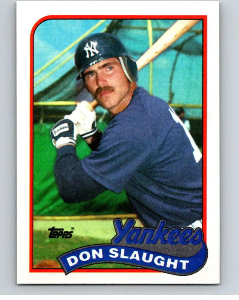 Baseball card of Don Slaught in batting stance for New York Yankees 1989 Topps #611