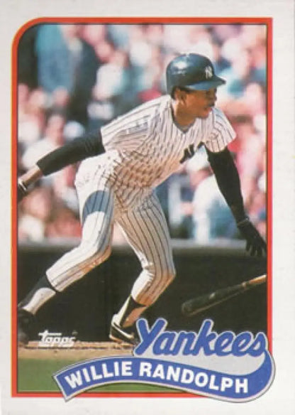 Willie Randolph in pinstripes watching his hit on a New York Yankees baseball card