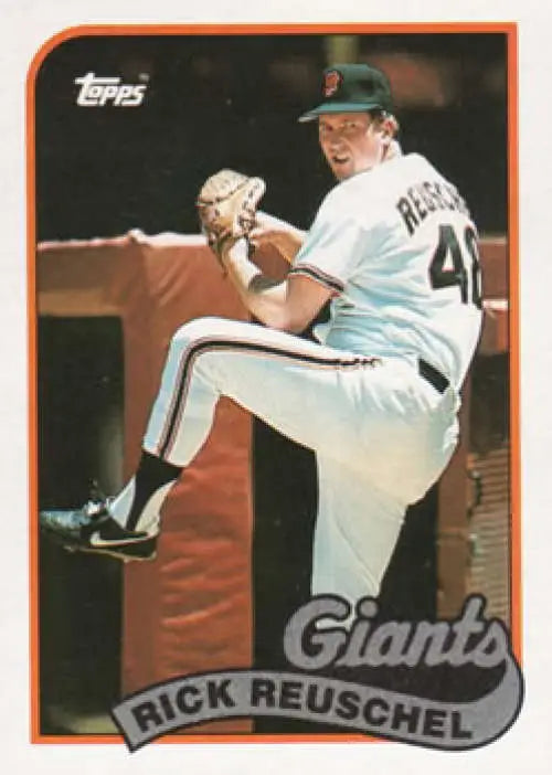 Baseball card of Rick Reuschel, San Francisco Giants pitcher in white uniform mid-windup