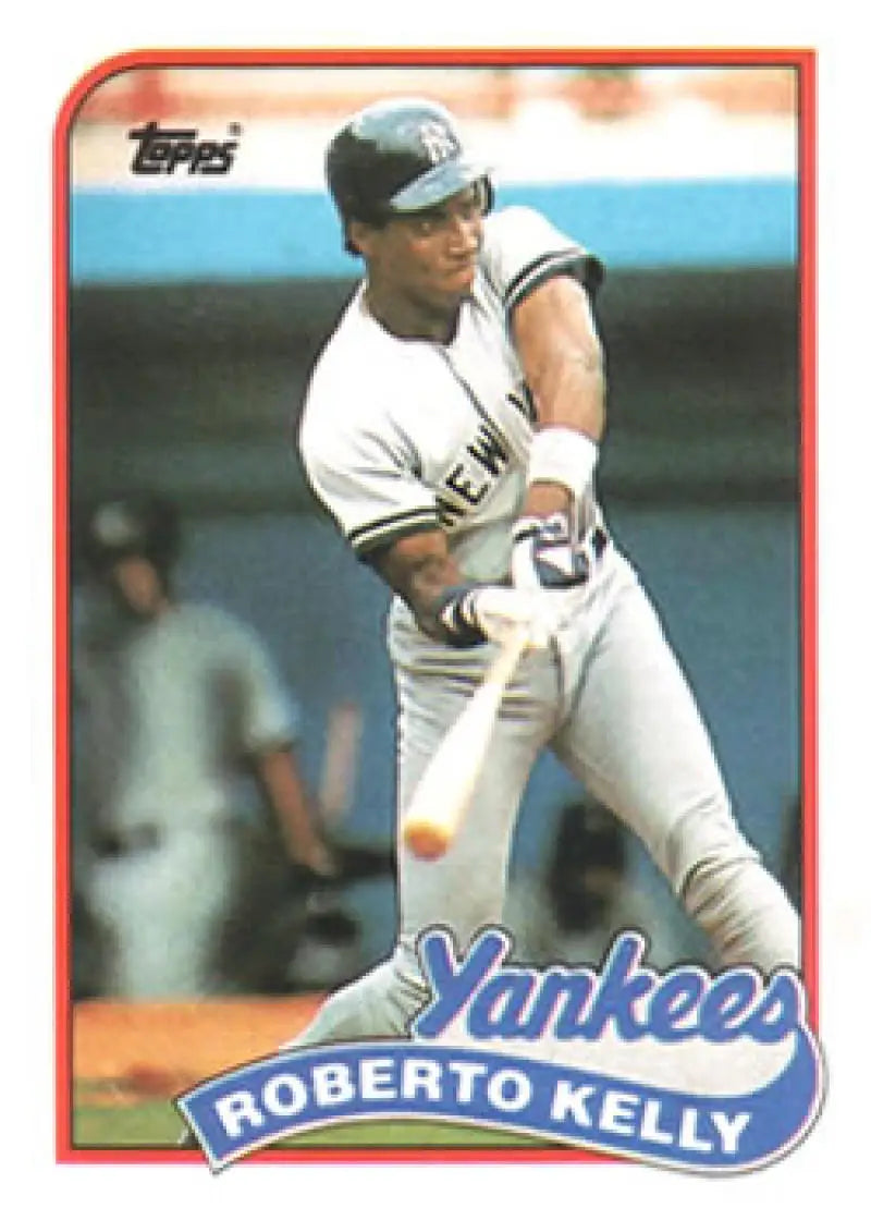 Roberto Kelly UER baseball card showing Yankees player mid-swing in white uniform