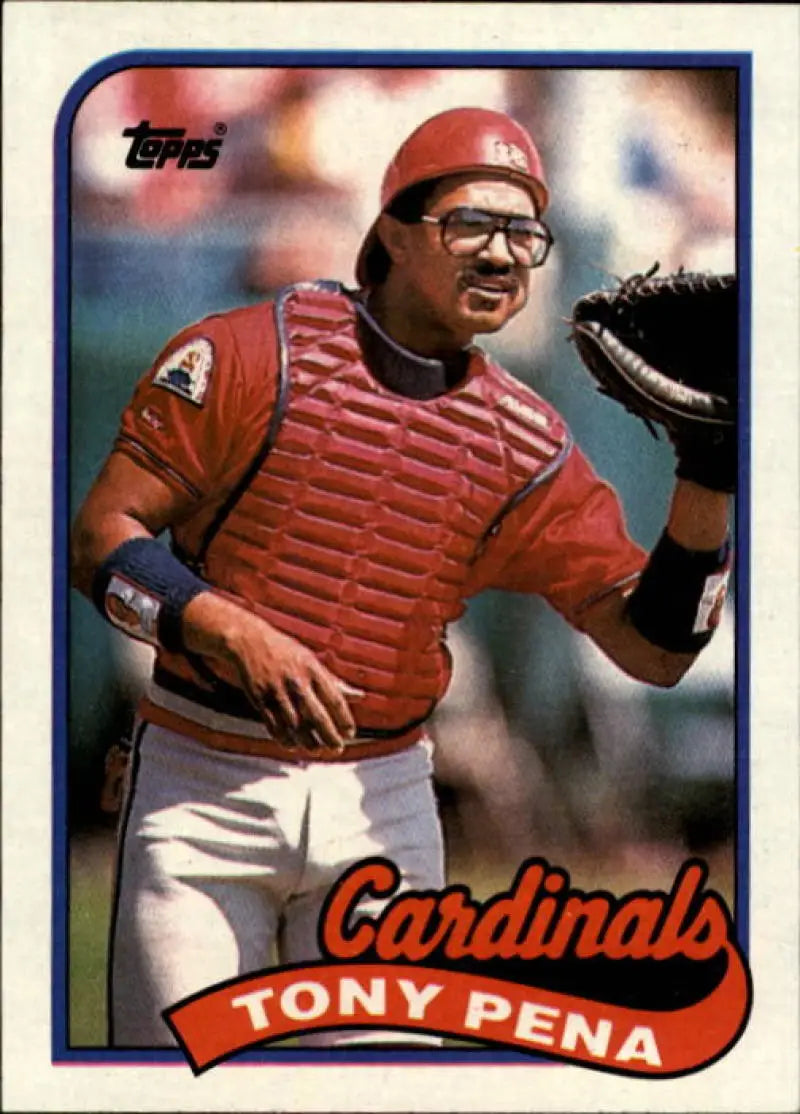 1989 Topps #715 Tony Pena baseball card of St. Louis Cardinals catcher in gear