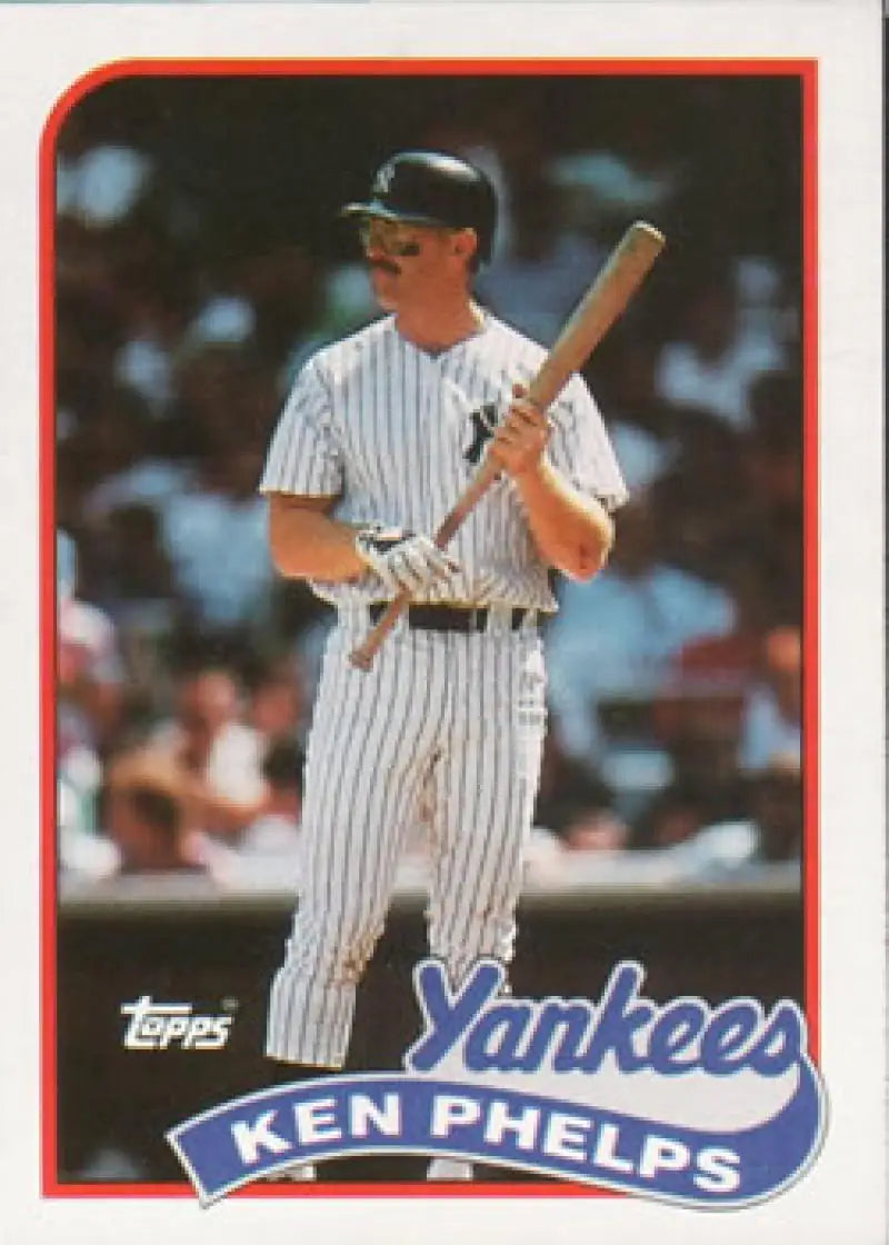 Ken Phelps New York Yankees Baseball Card in pinstripe uniform with bat