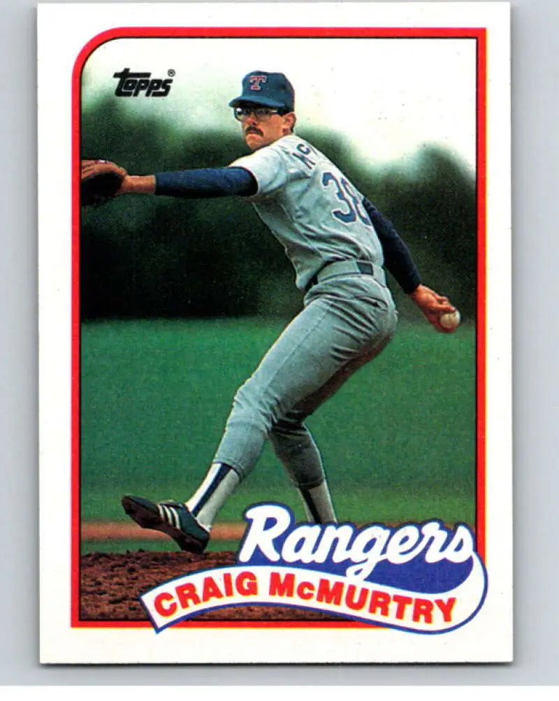 Vintage 1989 Topps #779 Craig McMurtry Texas Rangers baseball card in mid-delivery