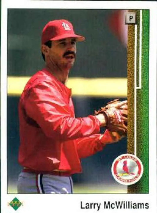 A St. Louis Cardinals player in red uniform prepares to throw on an Upper Deck baseball card