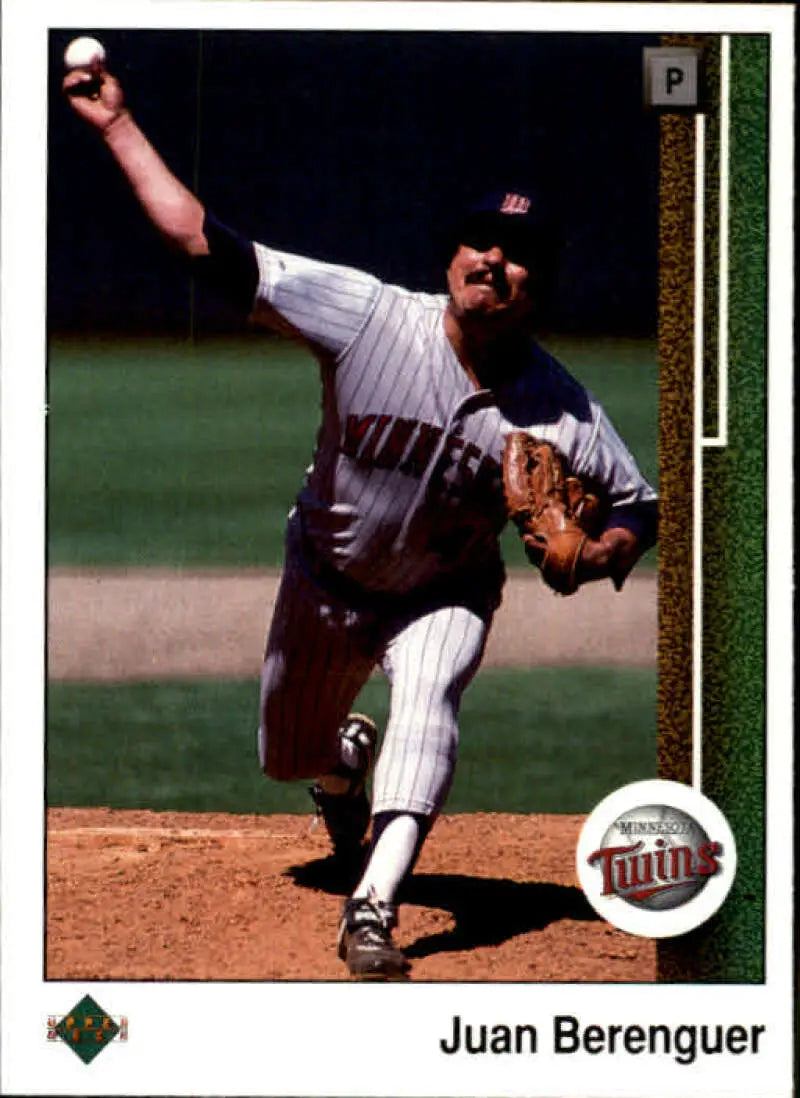 Baseball pitcher Juan Berenguer in Minnesota Twins uniform mid-delivery during a game