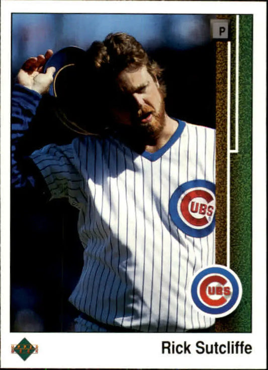 Rick Sutcliffe in Chicago Cubs uniform throwing a ball on a baseball card