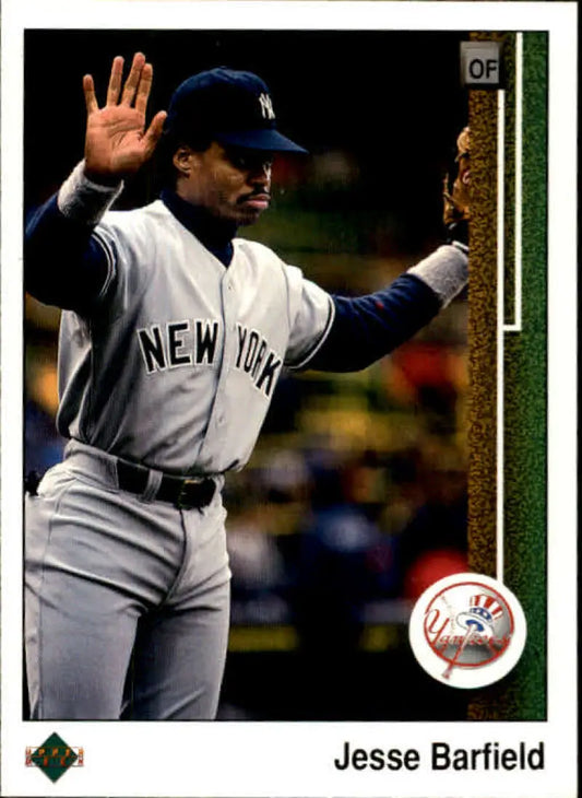 Jesse Barfield in New York Yankees gray uniform raising his hand for Upper Deck card